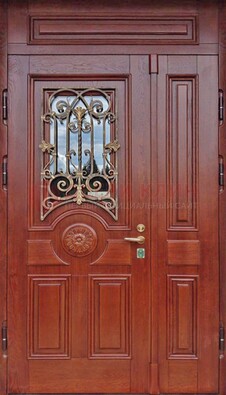 Филенчатая железная дверь со стеклом и ковкой ДСК-204 в Смоленске
