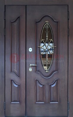 Темная металлическая дверь Винорит со стеклом и ковкой ДСК-239 в Смоленске