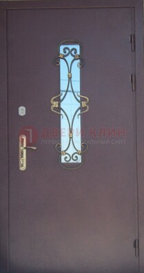 Металлическая дверь со стеклом и ковкой ДСК-77 в панельный дом в Серпухове