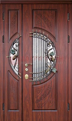 Железная дверь с виноритом и стеклом с ковкой ДВТ-170 в Смоленске